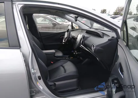 2021 Toyota Prius Prime Limited from USA, damaged, VIN JTDKAMFP1M3183513